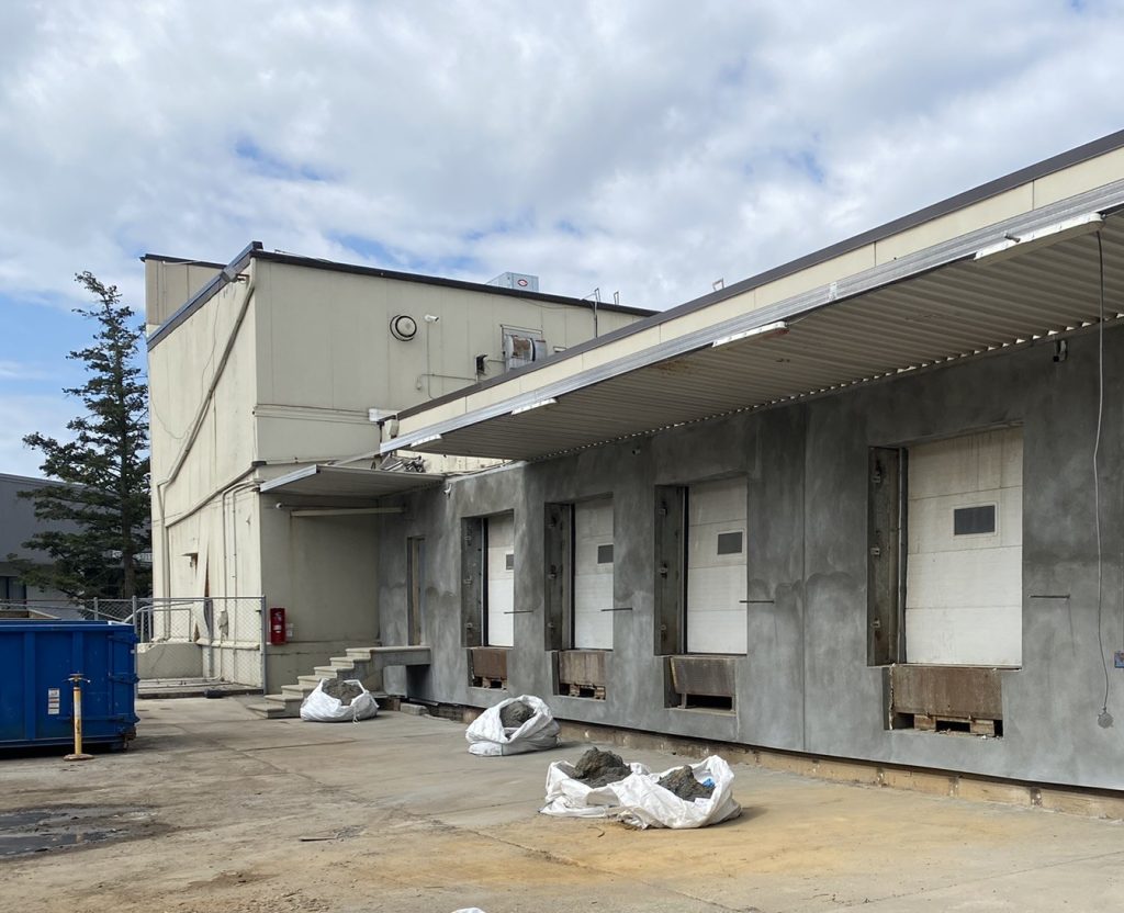 Loading dock featuring a new concrete face.